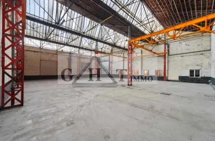 Location Entrepôt 828 m² - Photo 1