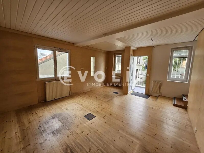 Location Bureaux 100 m² - Photo 1