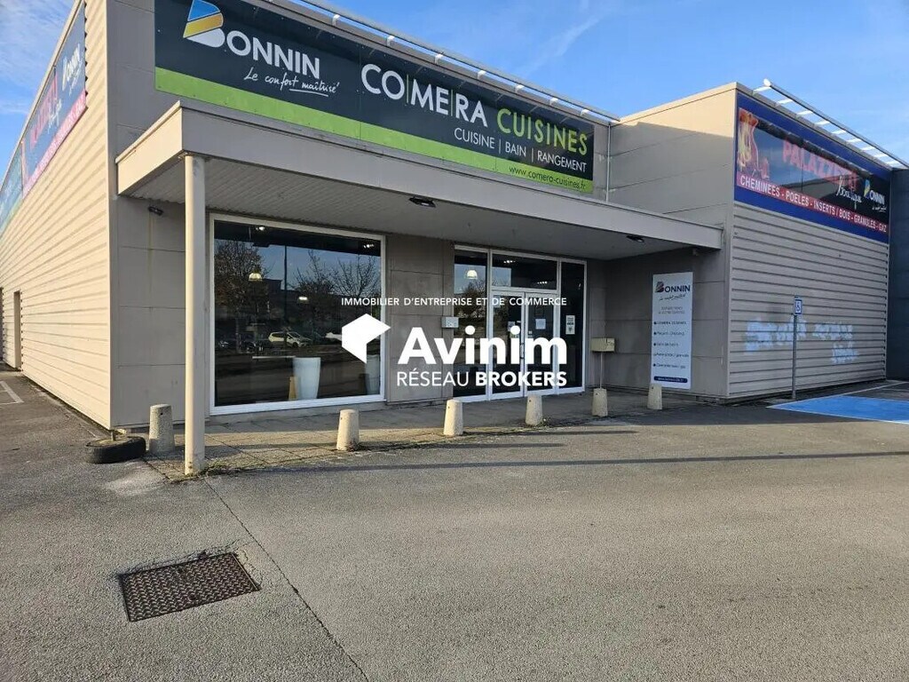 Location Commerce 421 m² - Photo 1