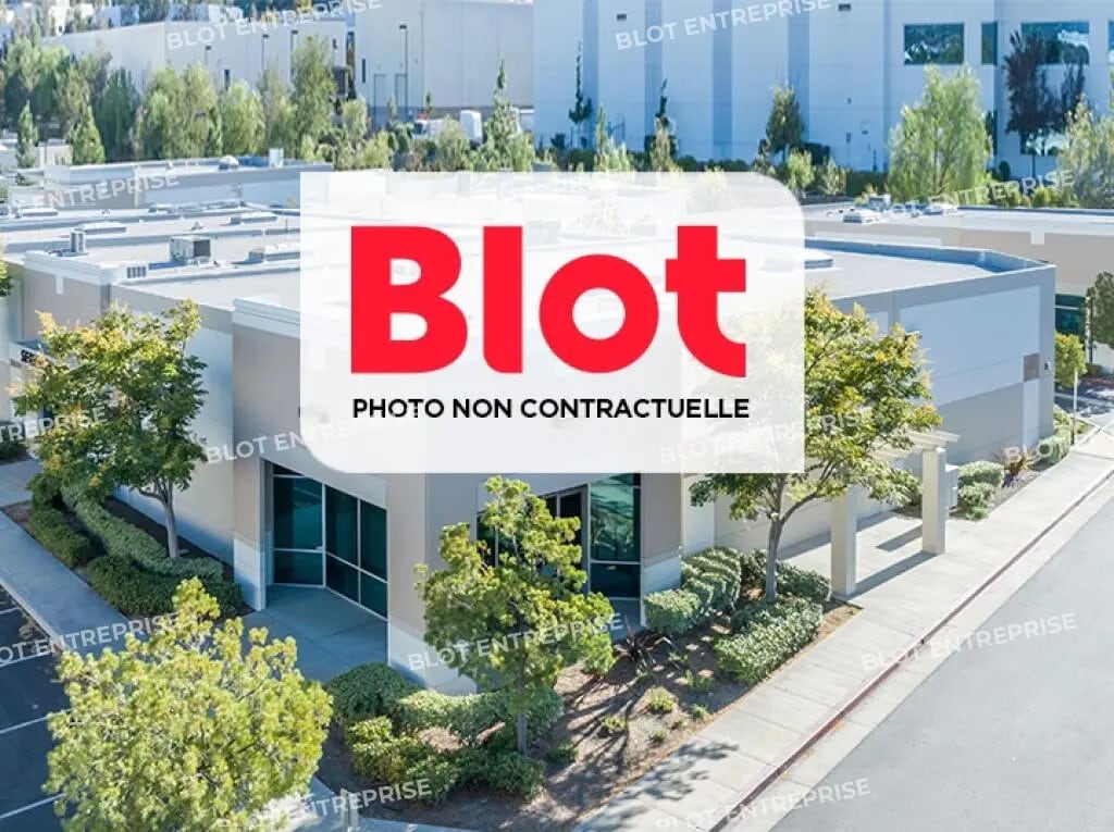 Location Commerce 450 m² - Photo 1