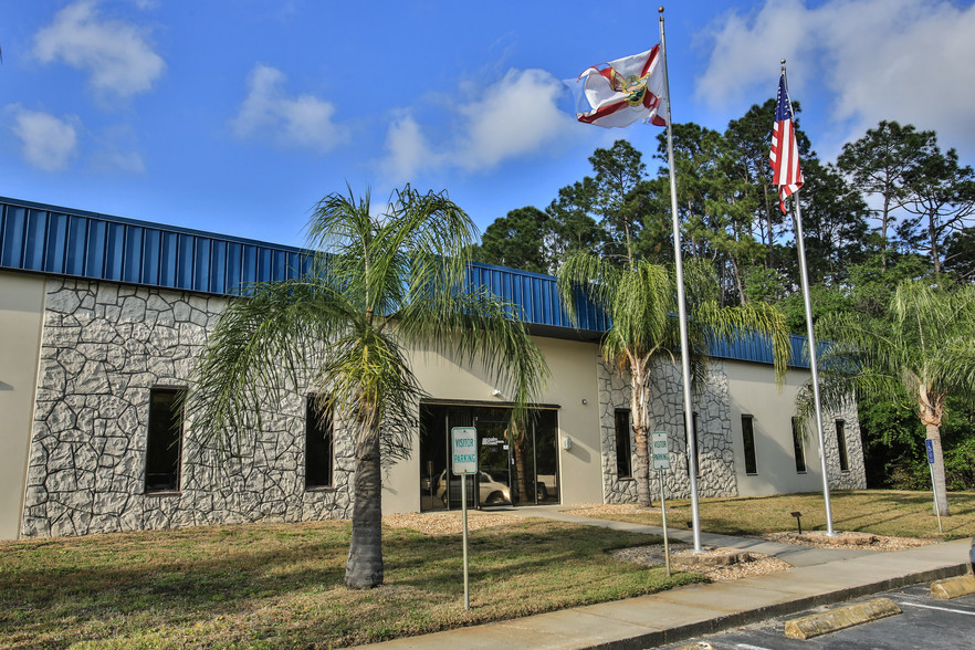 11 Commerce Blvd, Palm Coast, FL for rent - Building Photo - Image 3 of 15