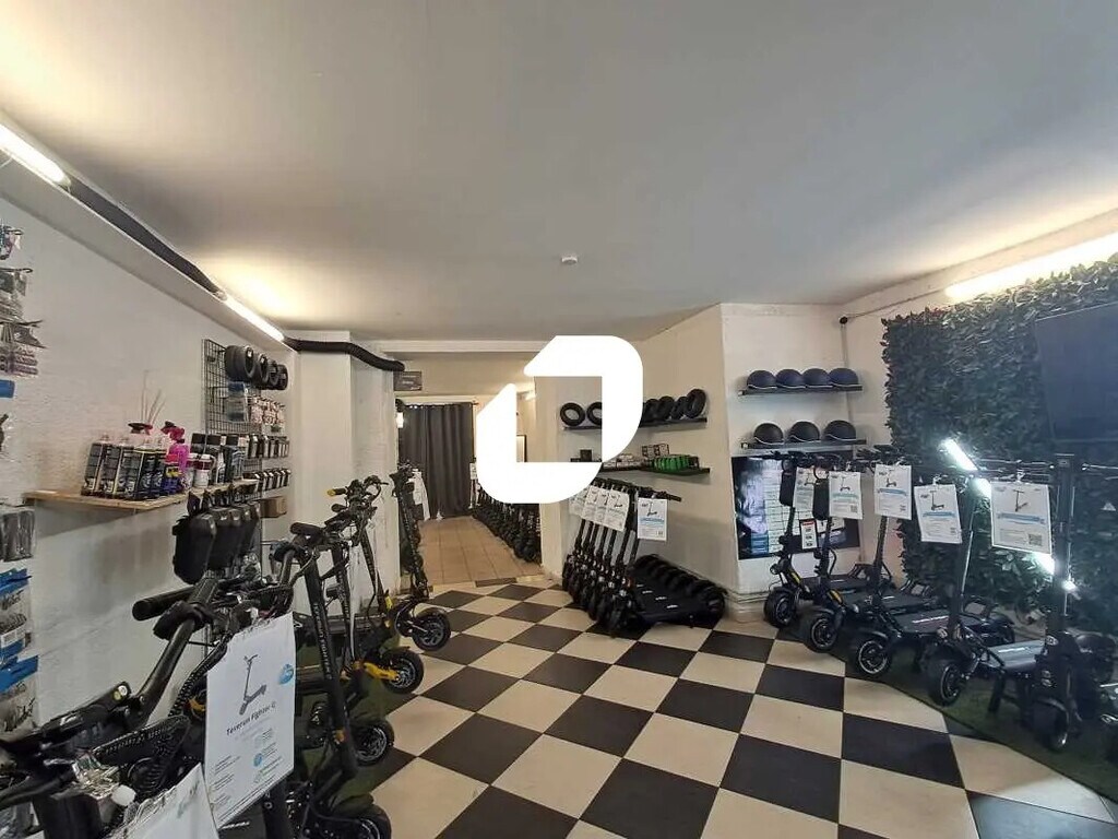 Location Commerce 110 m² - Photo 1