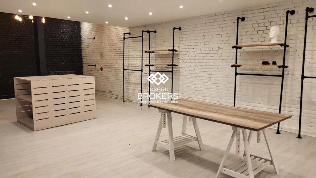Location Commerce 115 m² - Photo 1