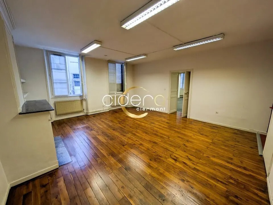 Location Bureaux 100 m² - Photo 1
