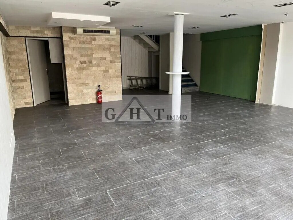 Location Commerce 114 m² - Photo 1