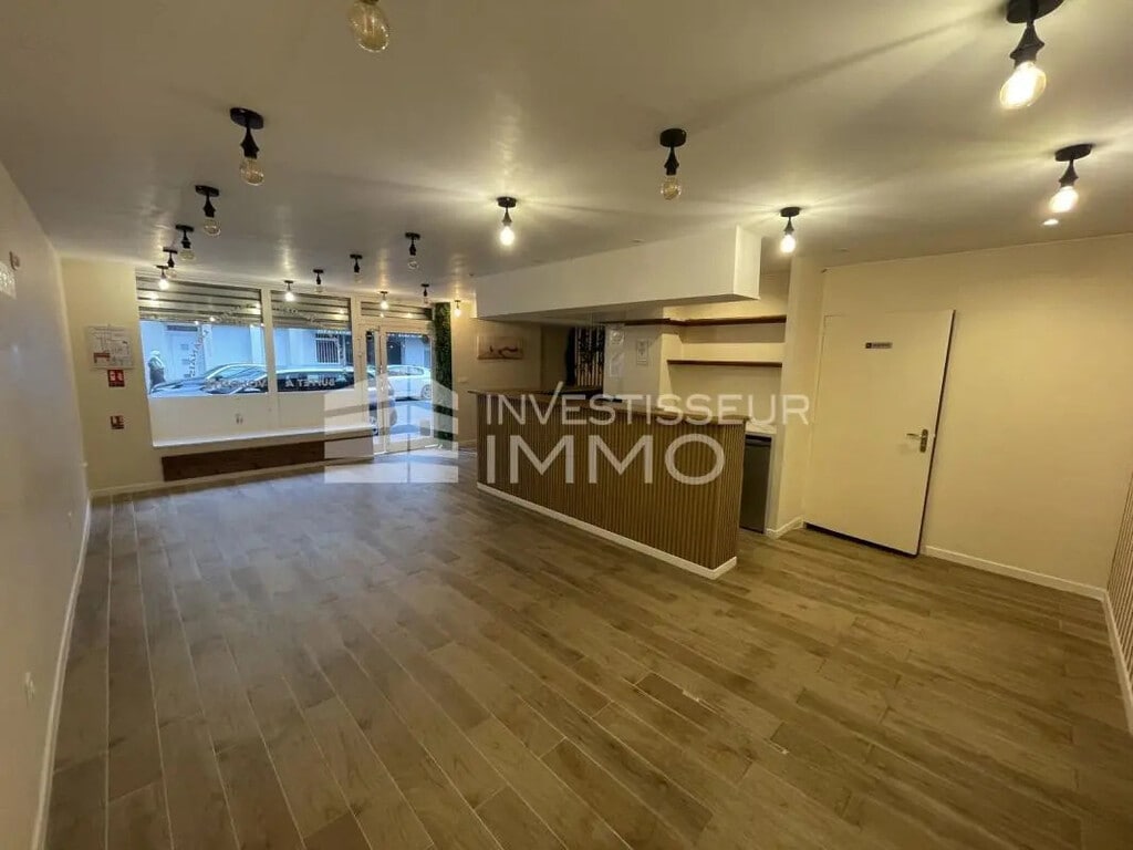 Location Commerce 120 m² - Photo 1