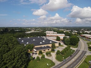 6450 Jimmy Carter Blvd, Norcross, GA for rent Building Photo- Image 1 of 7