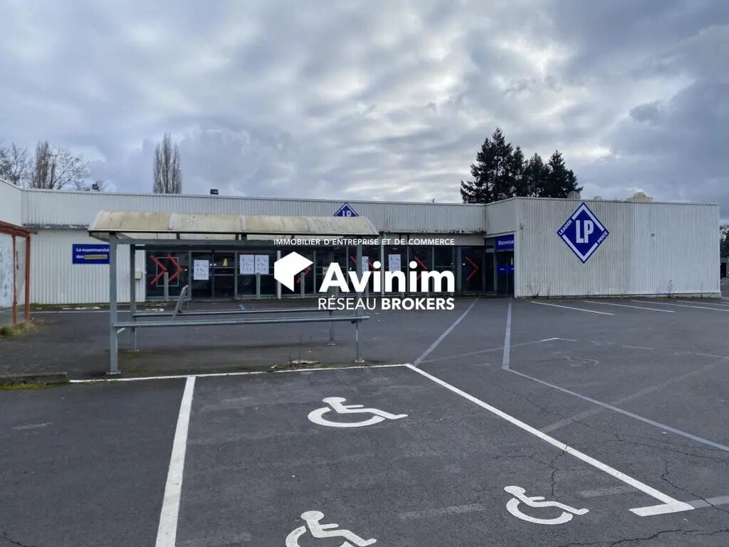 Location Commerce 1 723 m² - Photo 1