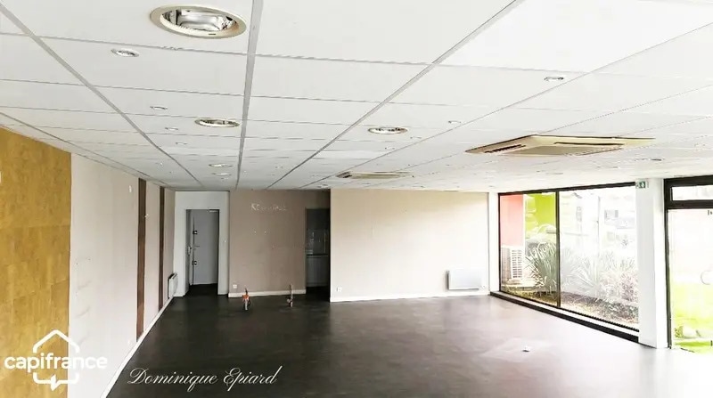 Location Commerce 128 m² - Photo 1
