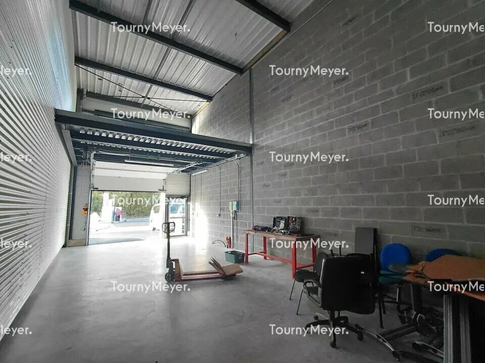Location Local d'activités 125 m² - Photo 1