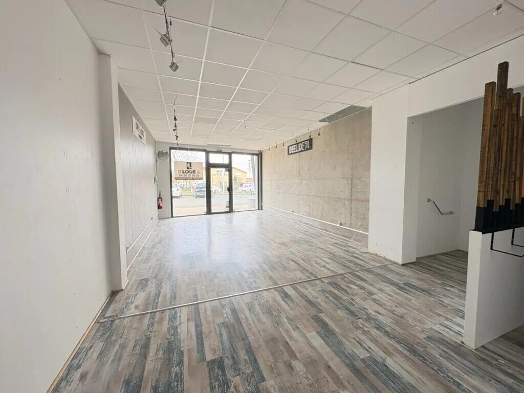 Location Commerce 76 m² - Photo 1