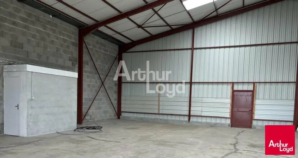 Location Local d'activités 150 m² - Photo 1