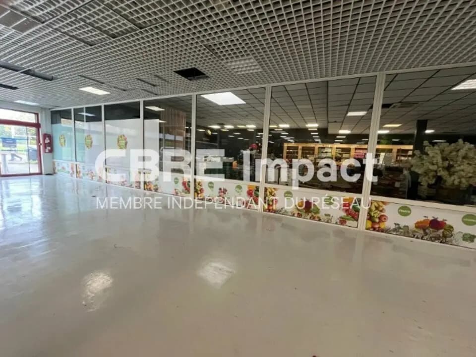 Location Commerce 202 m² - Photo 1