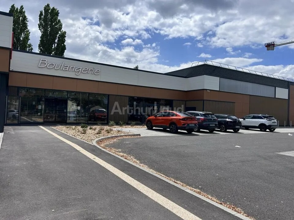 Location Commerce 233 m² - Photo 1