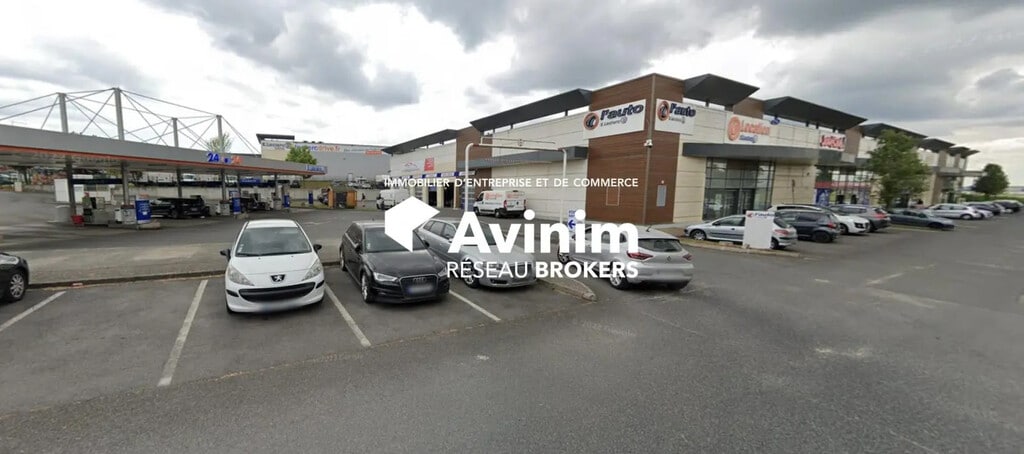 Location Commerce 892 m² - Photo 1