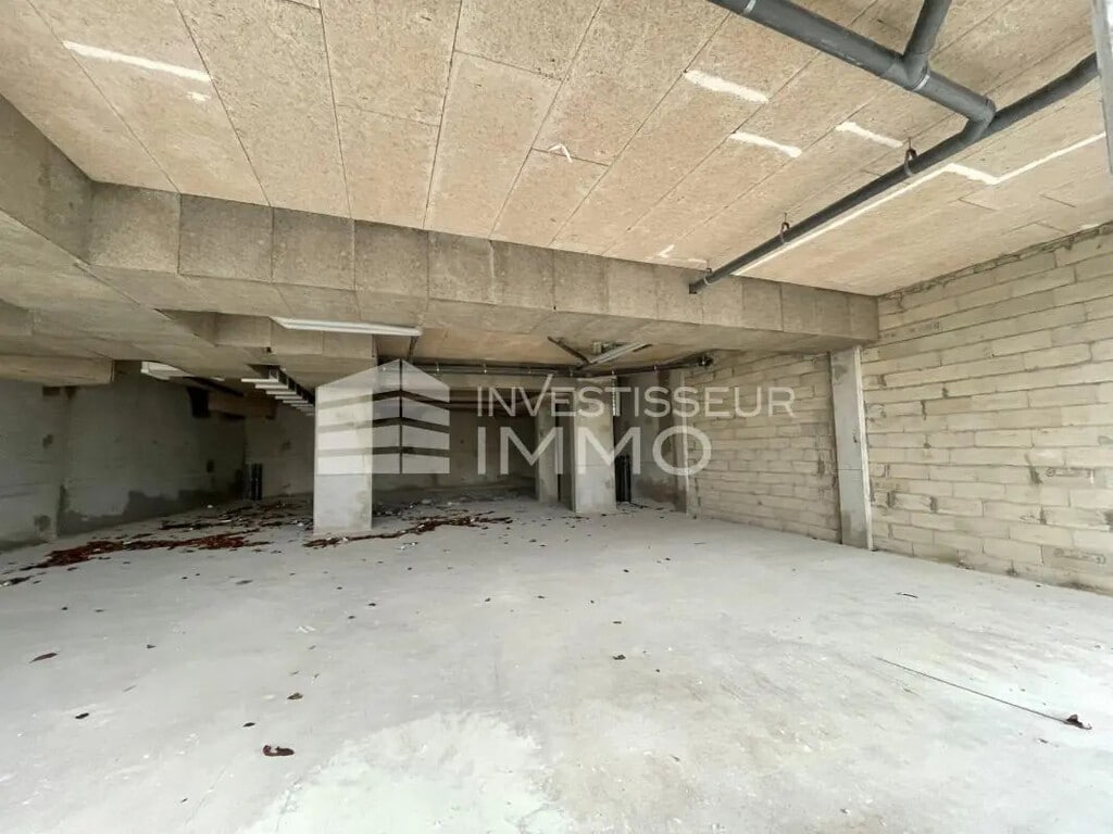 Location Commerce 127 m² - Photo 1
