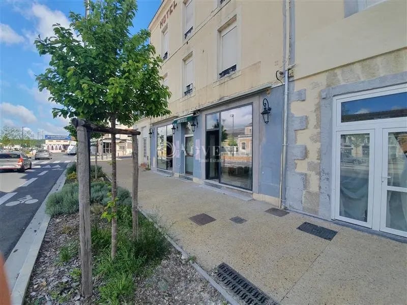 Location Commerce 113 m² - Photo 1