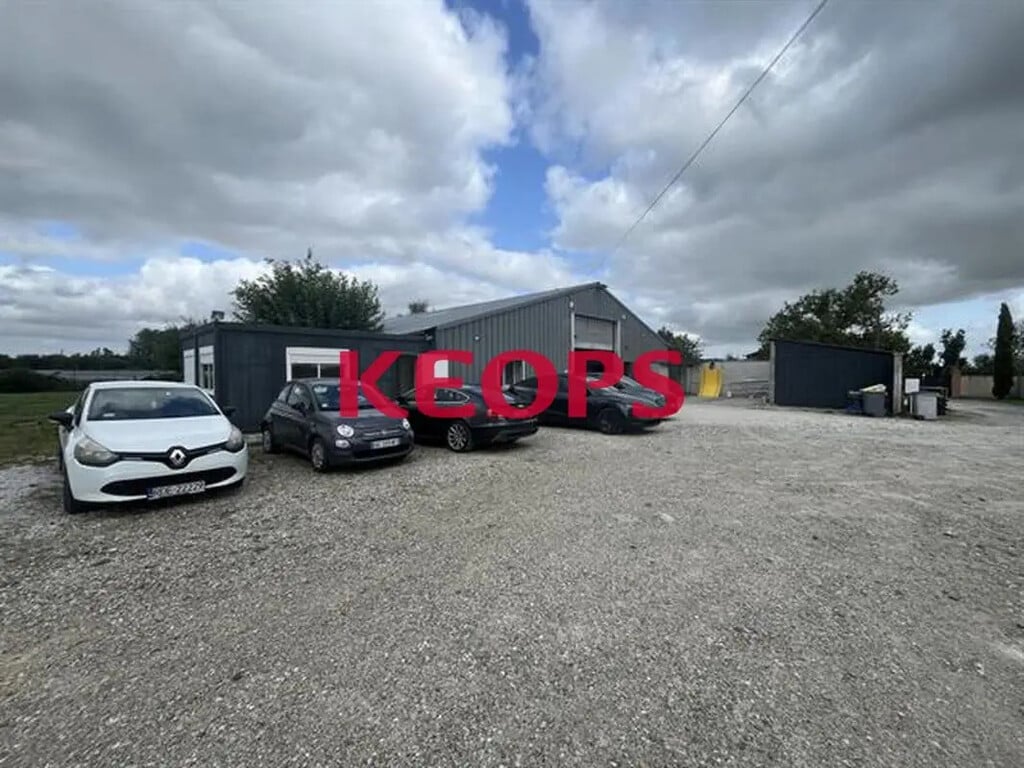 Location Local d'activités 720 m² - Photo 1
