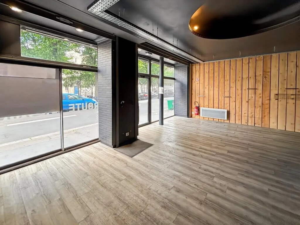 Location Commerce 115 m² - Photo 1