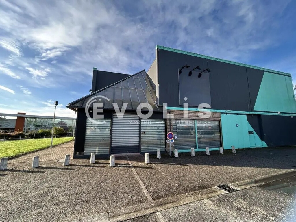 Location Commerce 450 m² - Photo 1