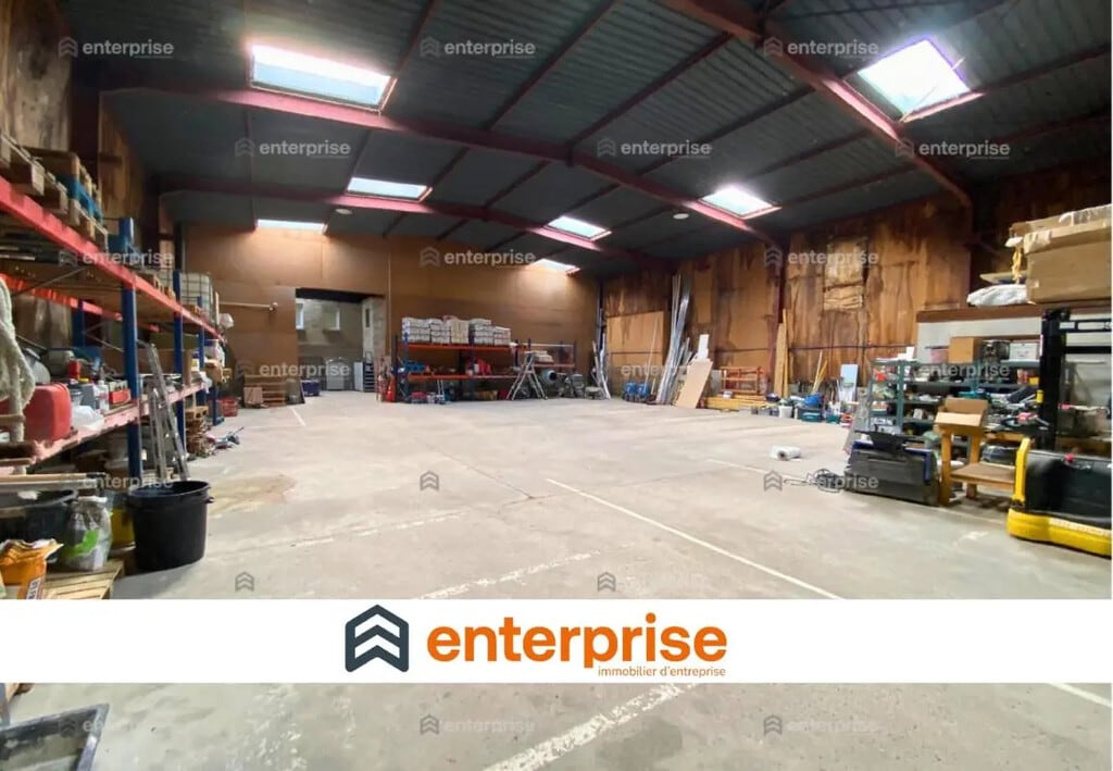 Location Local d'activités 703 m² - Photo 1