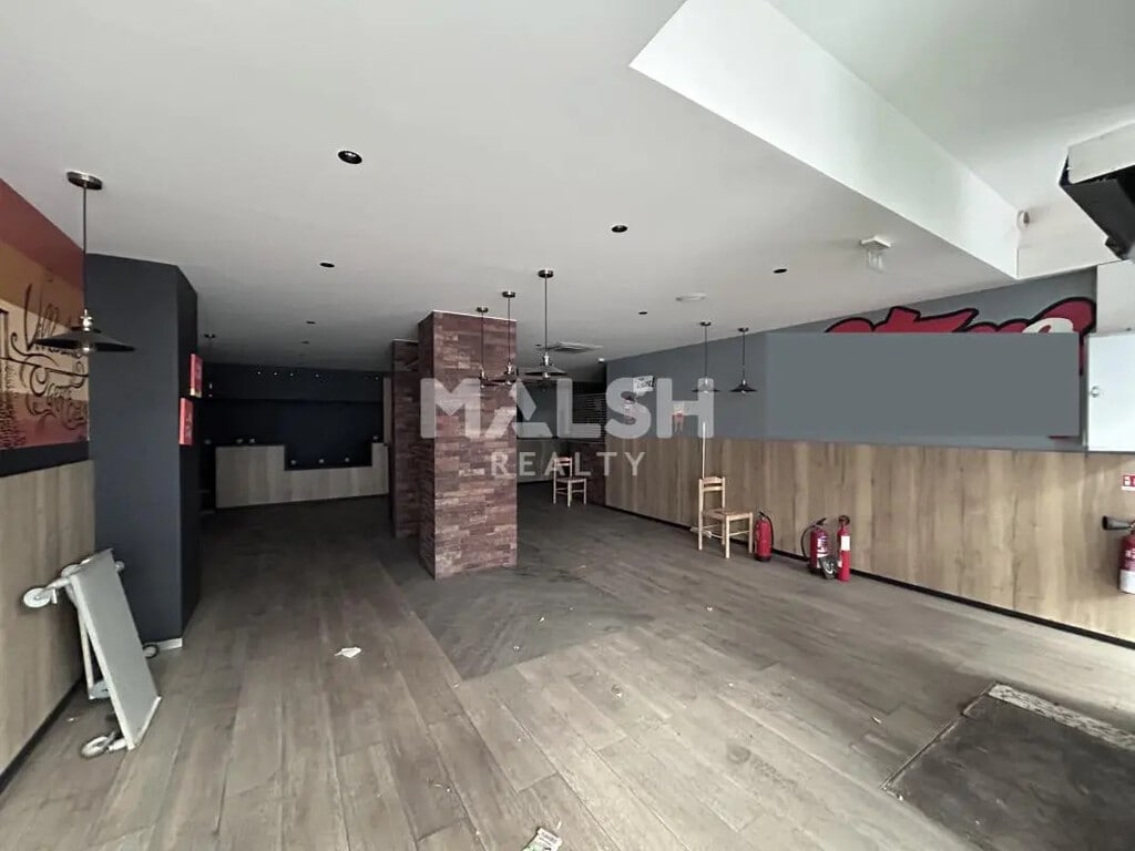 Location Commerce 215 m² - Photo 1