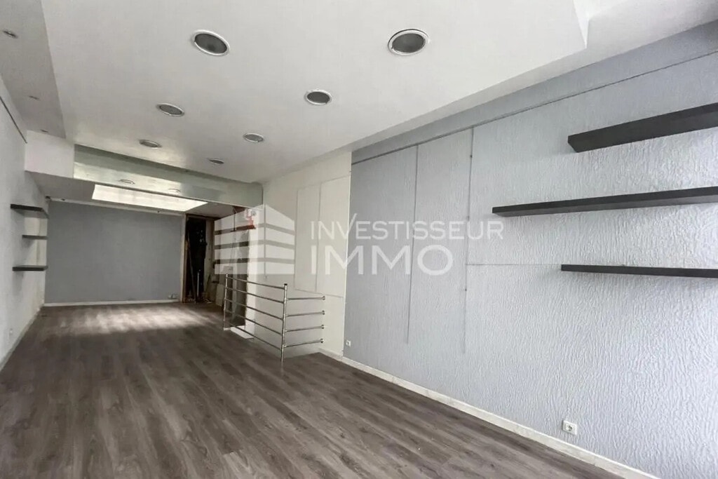 Location Commerce 77 m² - Photo 1