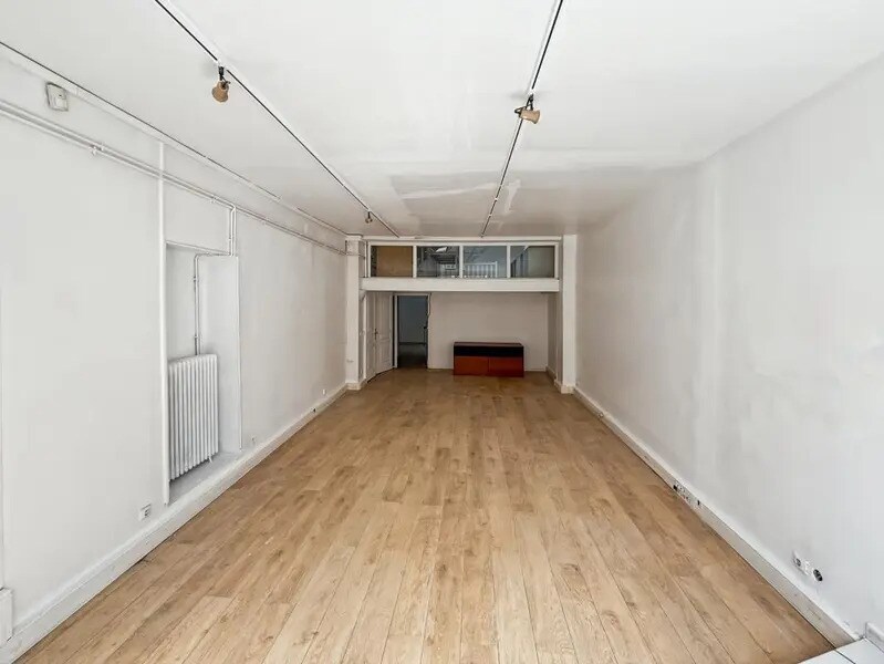 Location Bureaux 100 m² - Photo 1