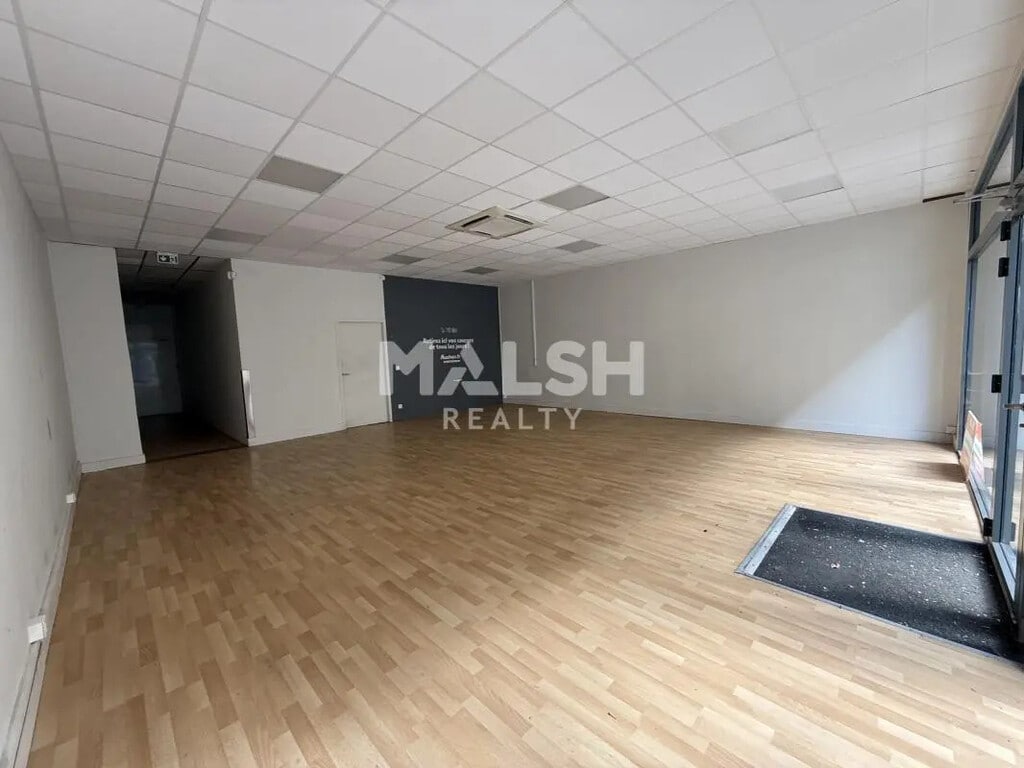 Location Commerce 125 m² - Photo 1