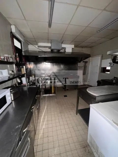 Location Commerce 140 m² - Photo 1