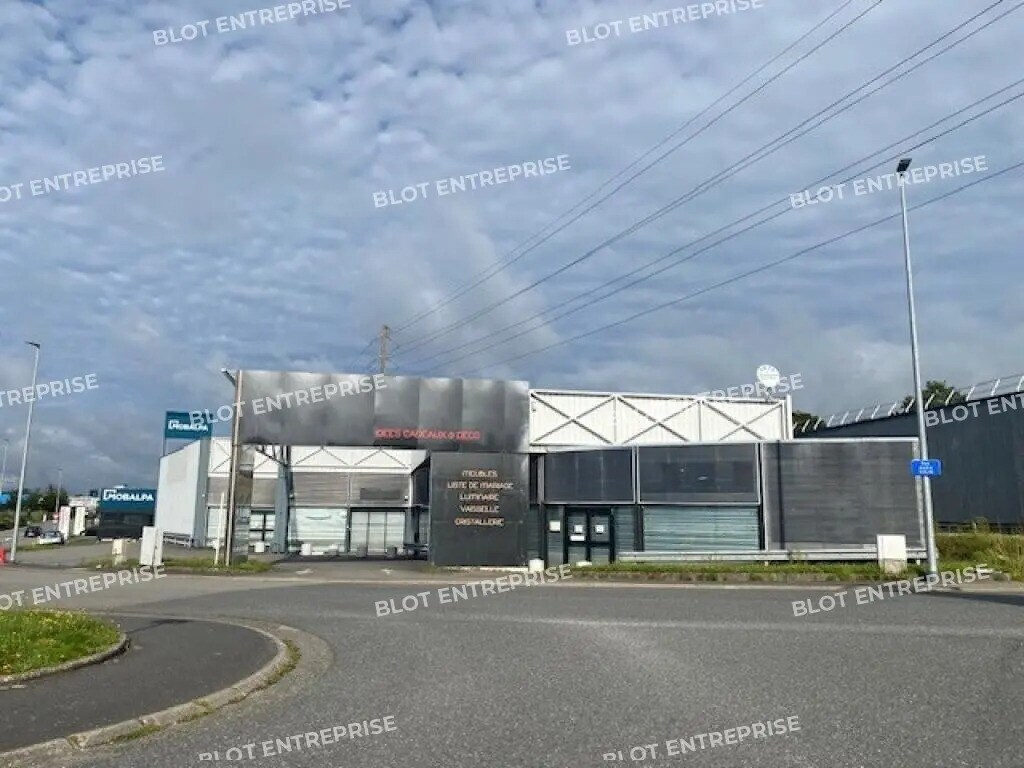 Location Commerce 997 m² - Photo 1