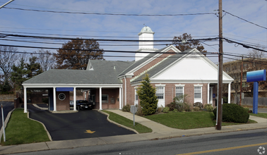 100 Sunnyside Blvd, Plainview, NY for rent Building Photo- Image 1 of 7