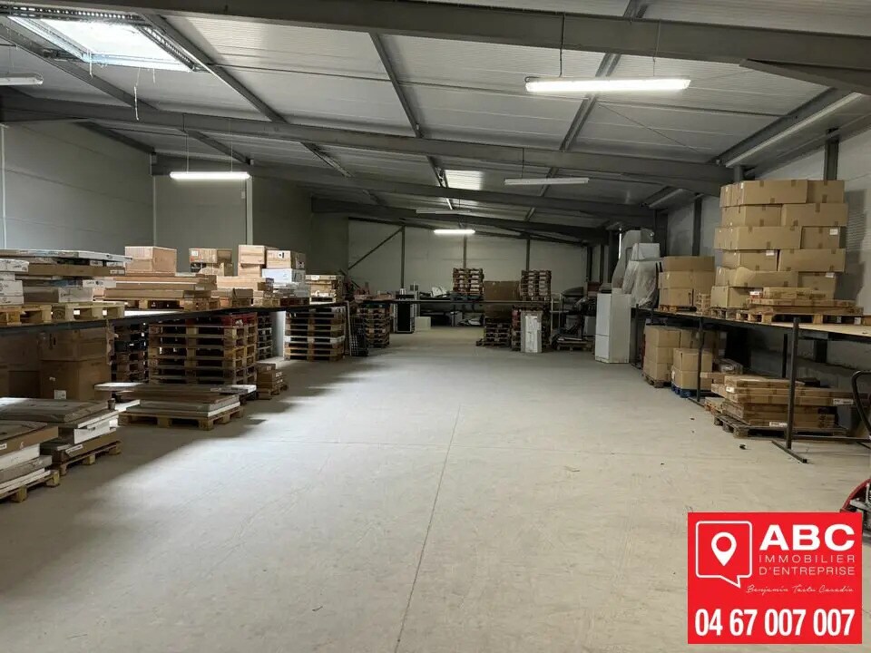 Location Local d'activités 560 m² - Photo 1