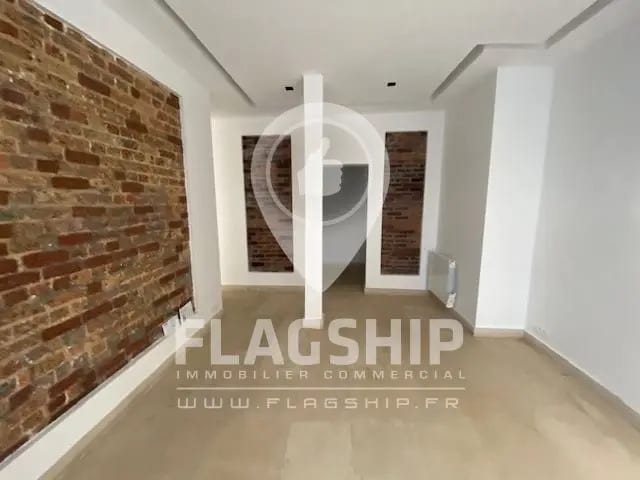 Location Commerce 60 m² - Photo 1