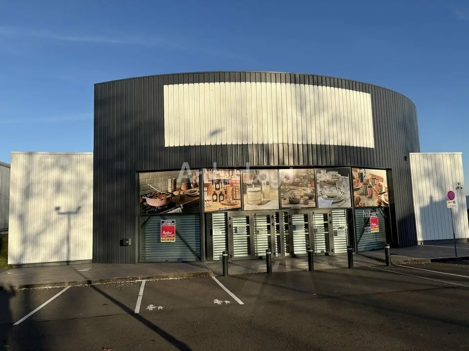 Location Commerce 1 410 m² - Photo 1