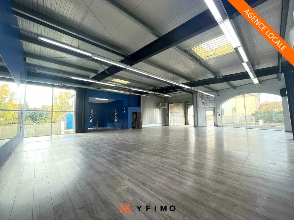 Location Commerce 662 m² - Photo 1