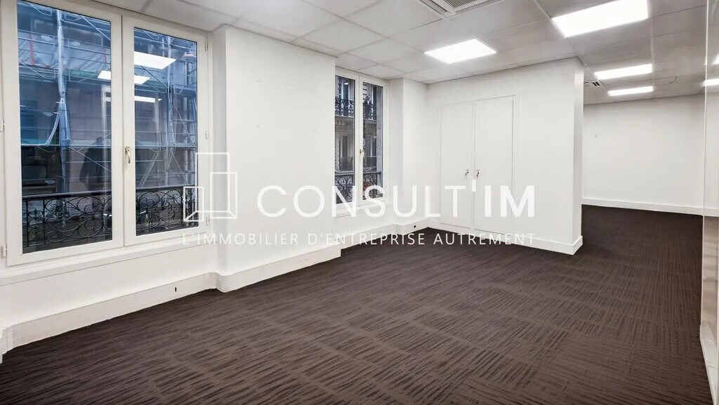 Location Bureaux 128 m² - Photo 1