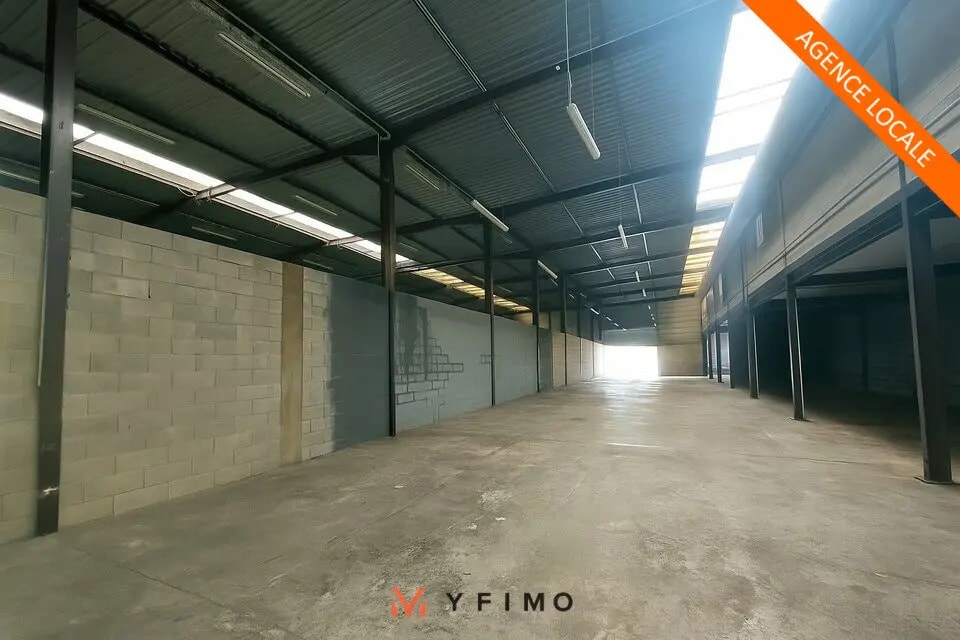 Location Local d'activités 600 m² - Photo 1