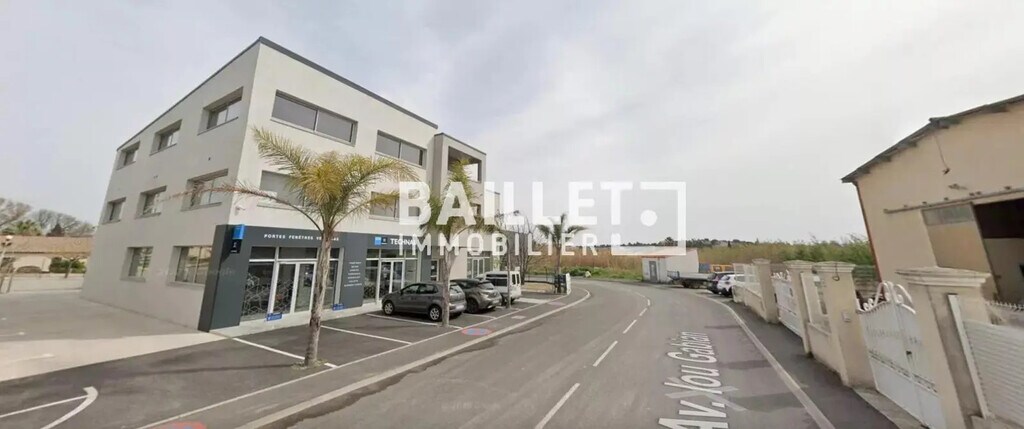 Location Bureaux 120 m² - Photo 1