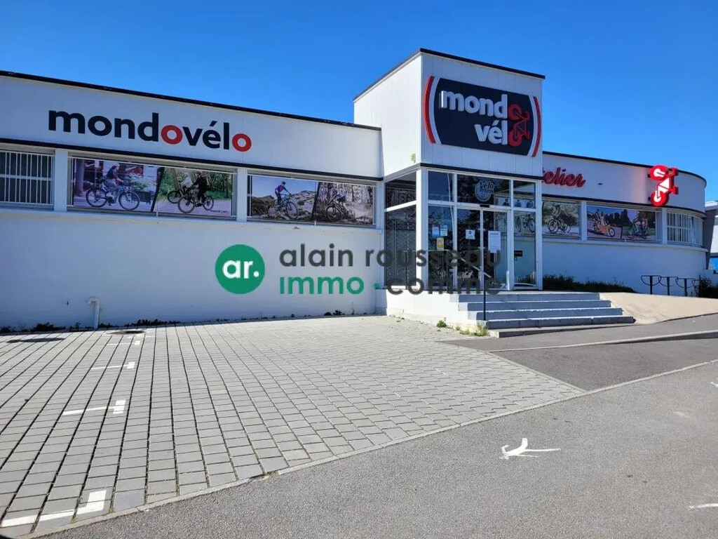 Location Commerce 992 m² - Photo 1