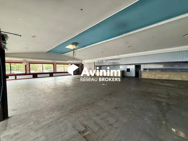 Location Commerce 740 m² - Photo 1