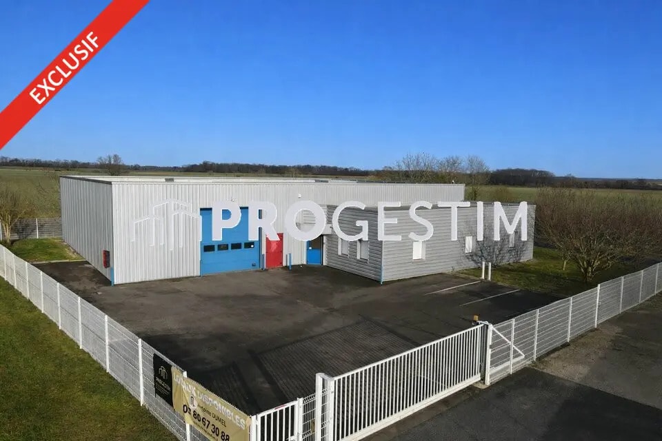 Location Local d'activités 600 m² - Photo 1