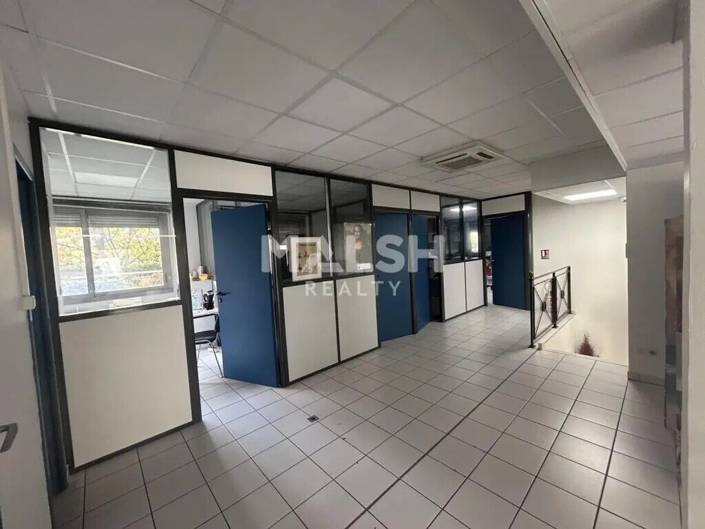 Location Commerce 110 m² - Photo 1