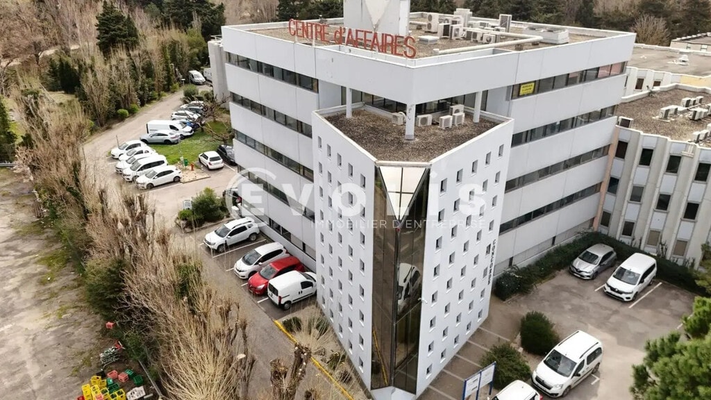 Location Bureaux 100 m² - Photo 1