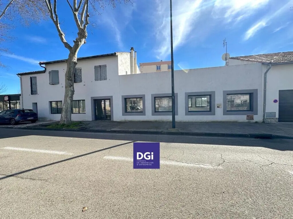 Location Commerce 120 m² - Photo 1