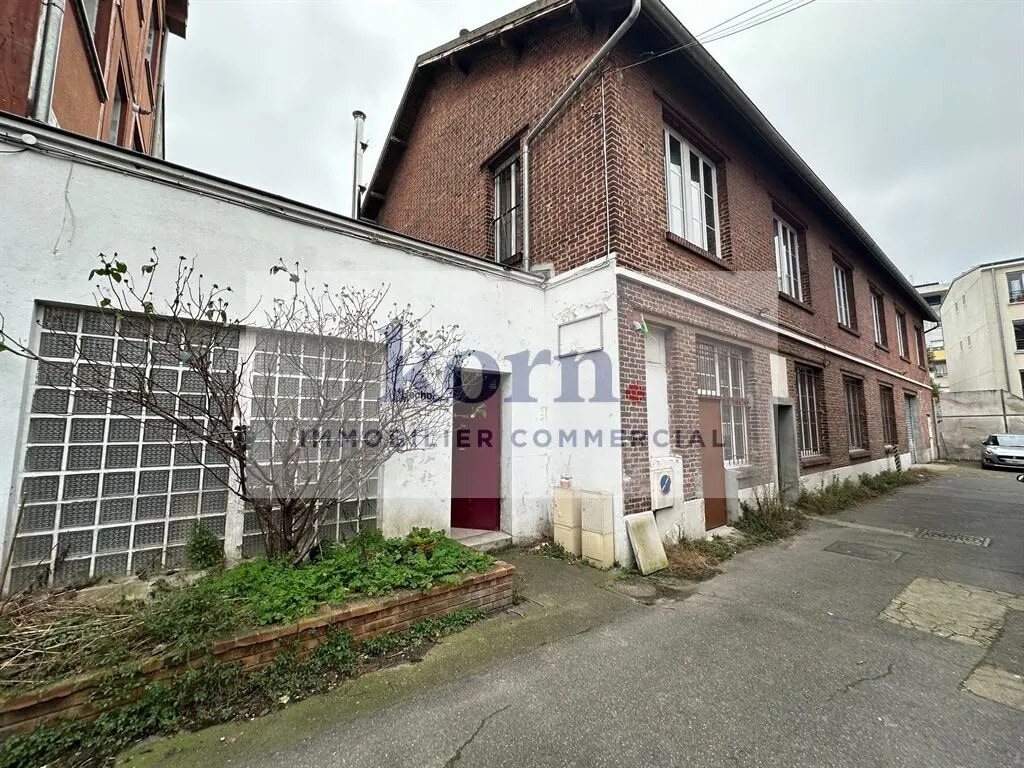 Location Commerce 617 m² - Photo 1