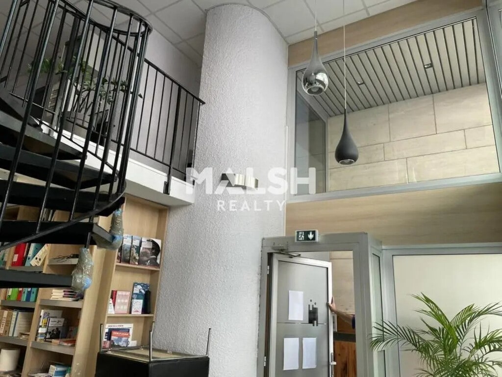 Location Bureaux 125 m² - Photo 1