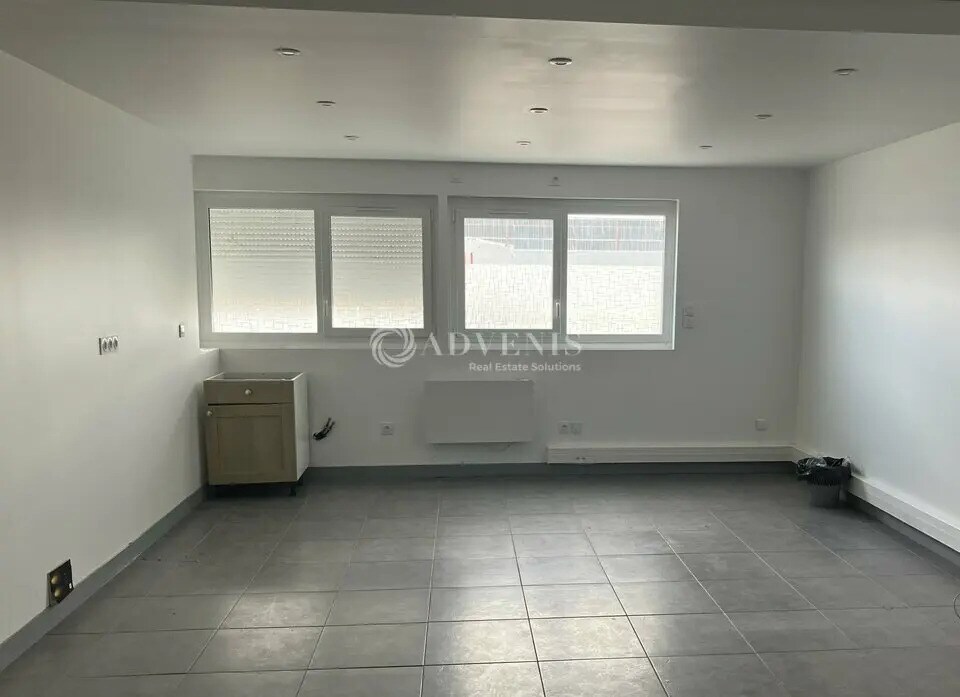 Location Bureaux 100 m² - Photo 1