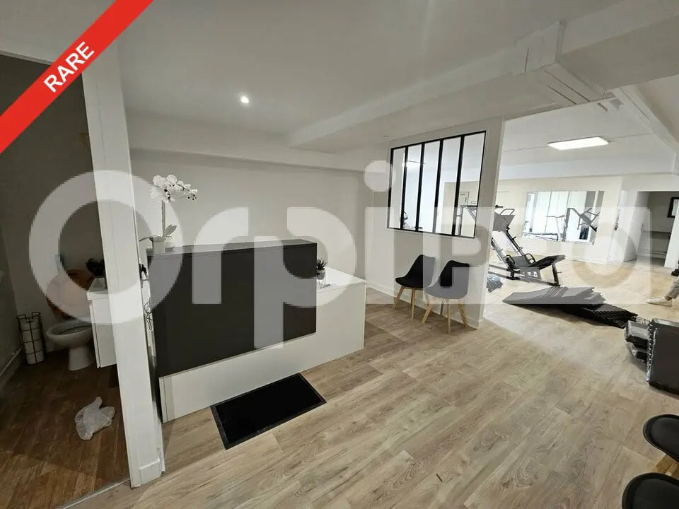 Location Commerce 152 m² - Photo 1