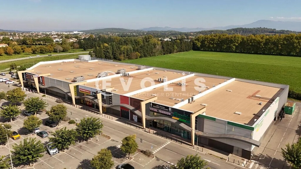 Location Commerce 630 m² - Photo 1